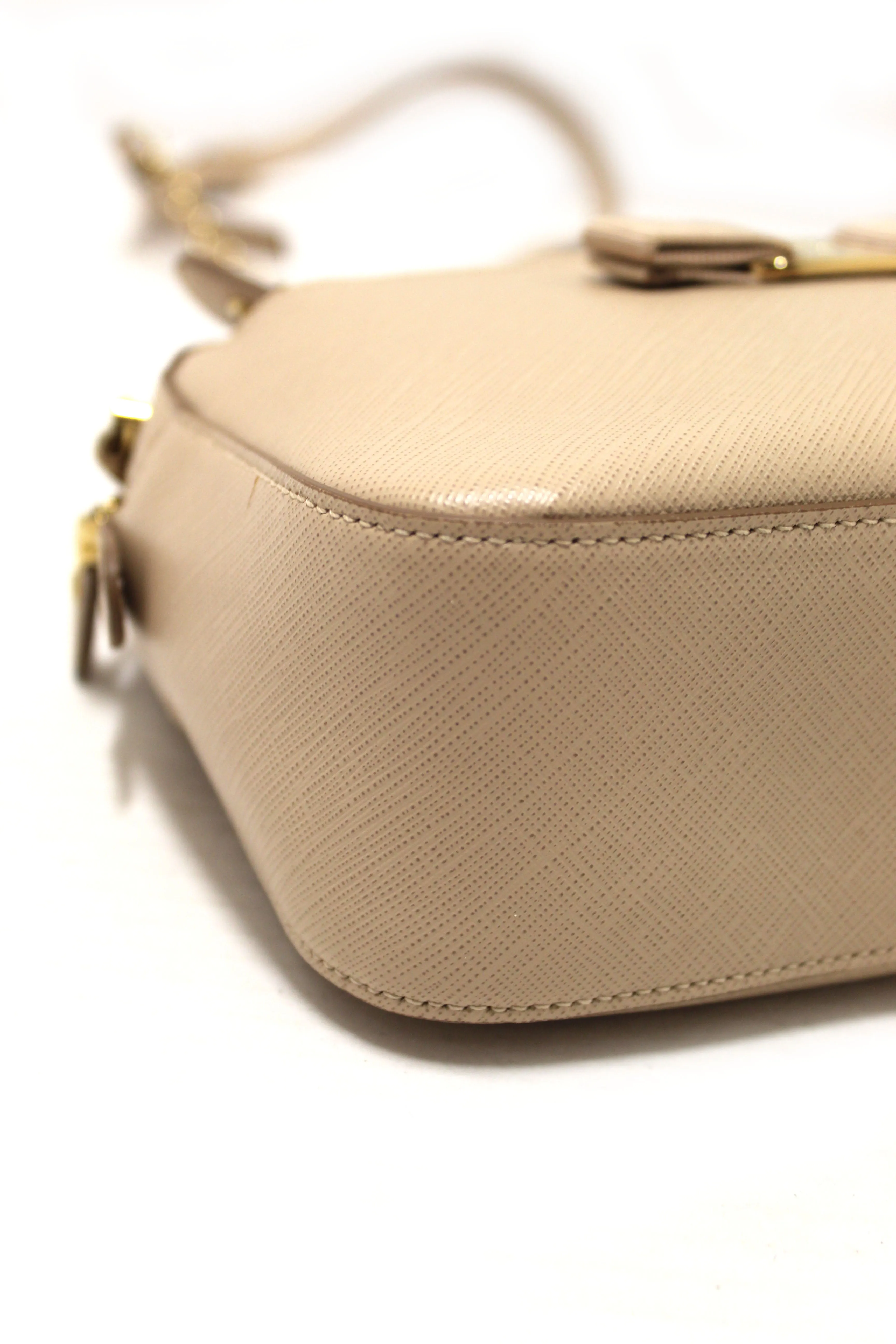 Authentic Salvatore Ferragamo Beige Calfskin Leather Lydia Bow Camera Crossbody Bag