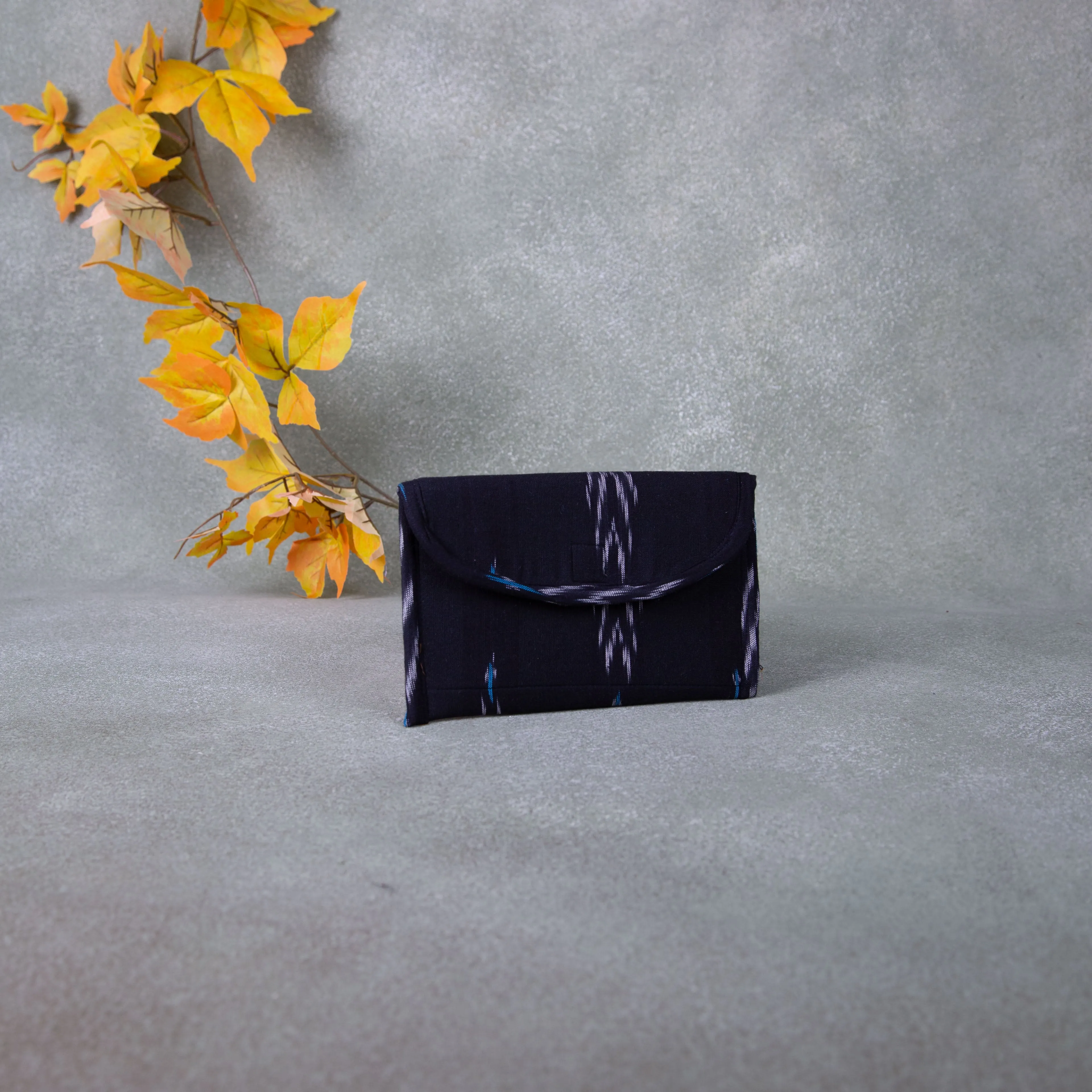 Ikat Clutch Black With Blue Prints.